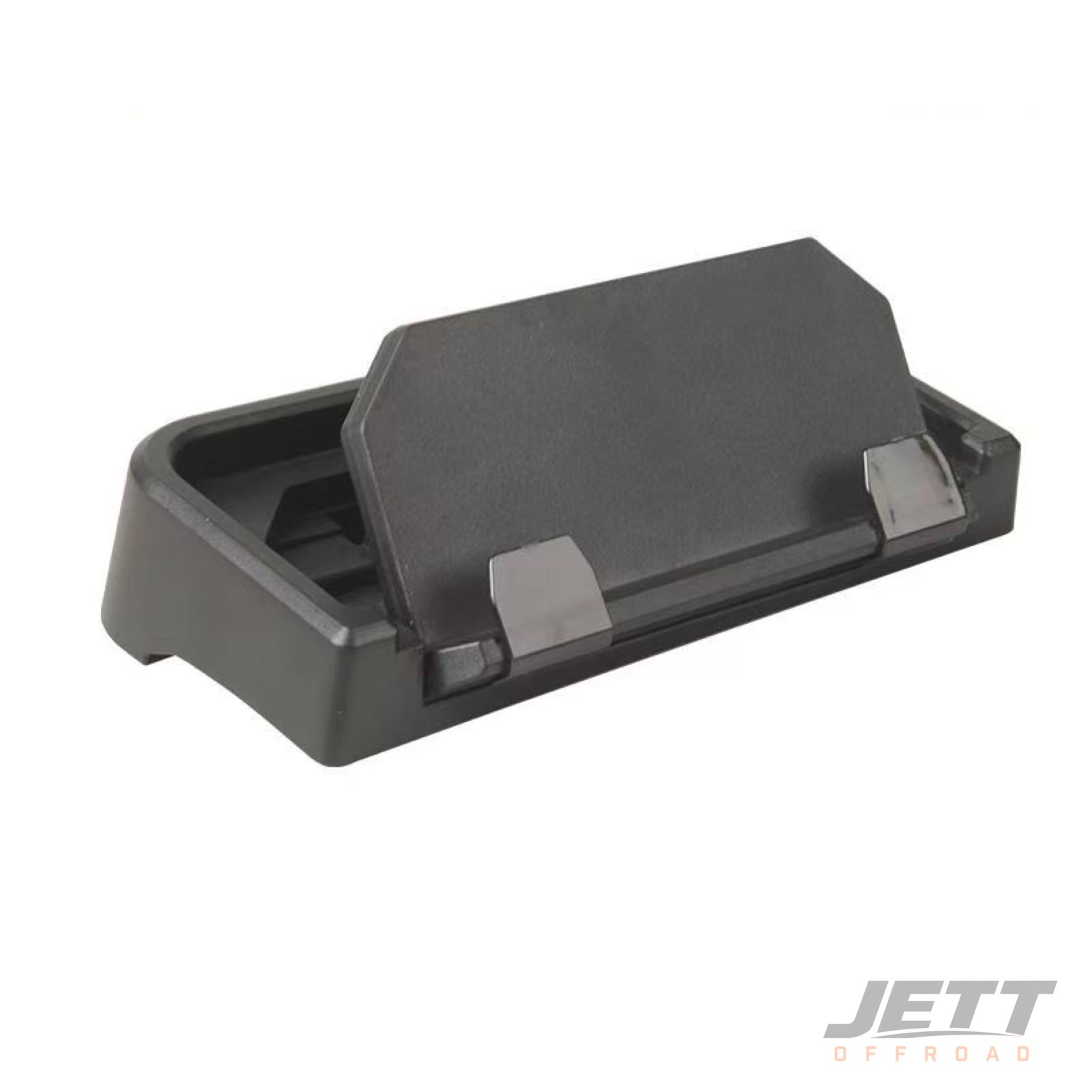 Angled view of dashboard phone mount and storage tray
